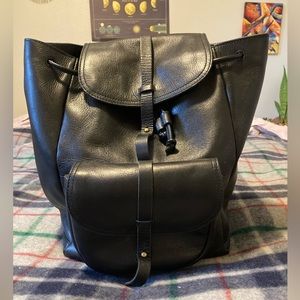 Madewell transport rucksack in black leather.